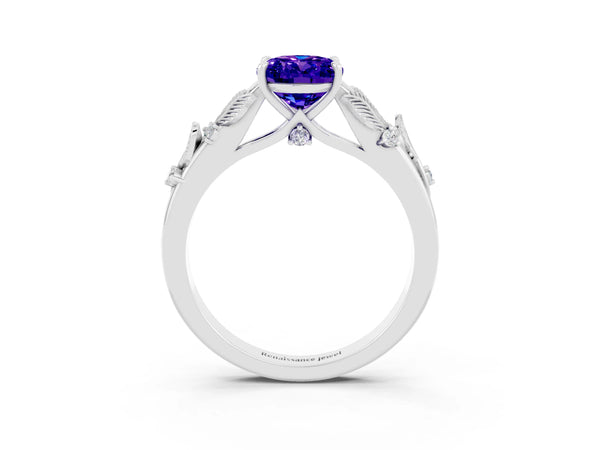 Platinum Oval Cut Tanzanite Solitaire Ring with Leaf Motif Band and Four-Prong Setting