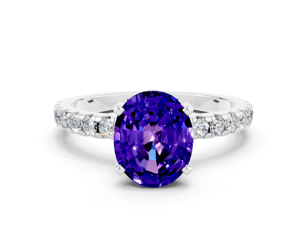 White gold Oval Cut Tanzanite Solitaire Ring with Round  Pavé Band and Four-Prong Setting