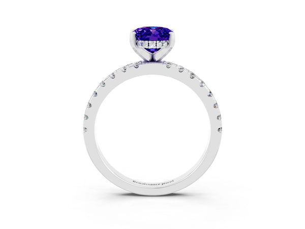 Silver Oval Cut Tanzanite Solitaire Ring with Round  Pavé Band and Four-Prong Setting