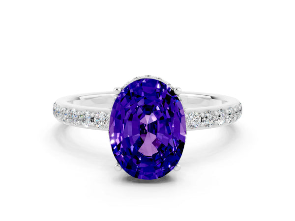 Platinum Oval Cut Tanzanite Solitaire Ring with Pavé Band and Hidden Halo