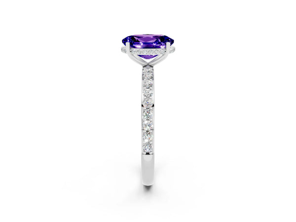 Platinum Oval Cut Tanzanite Solitaire Ring with Pavé Band and Hidden Halo
