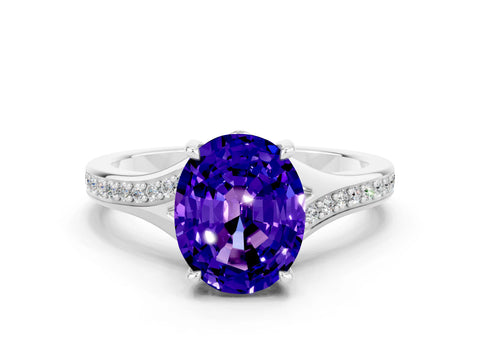 White gold Oval Cut Tanzanite Solitaire Ring with Pavé Band and Prong Setting