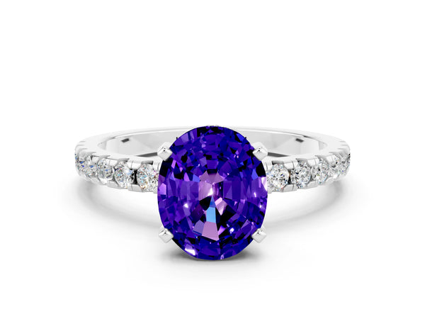 White gold Oval Cut Tanzanite Solitaire Ring with Round  Pavé Band and Four-Prong Setting