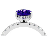 White gold Oval Cut Tanzanite Solitaire Ring with Round  Pavé Band and Four-Prong Setting_64