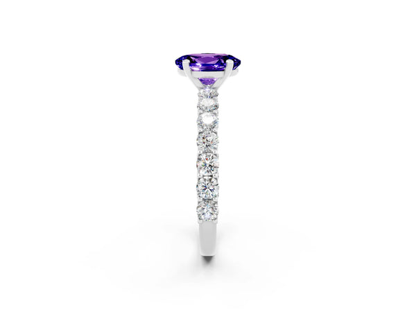 White gold Oval Cut Tanzanite Solitaire Ring with Shared Prong Pavé Band and Four-Prong Setting