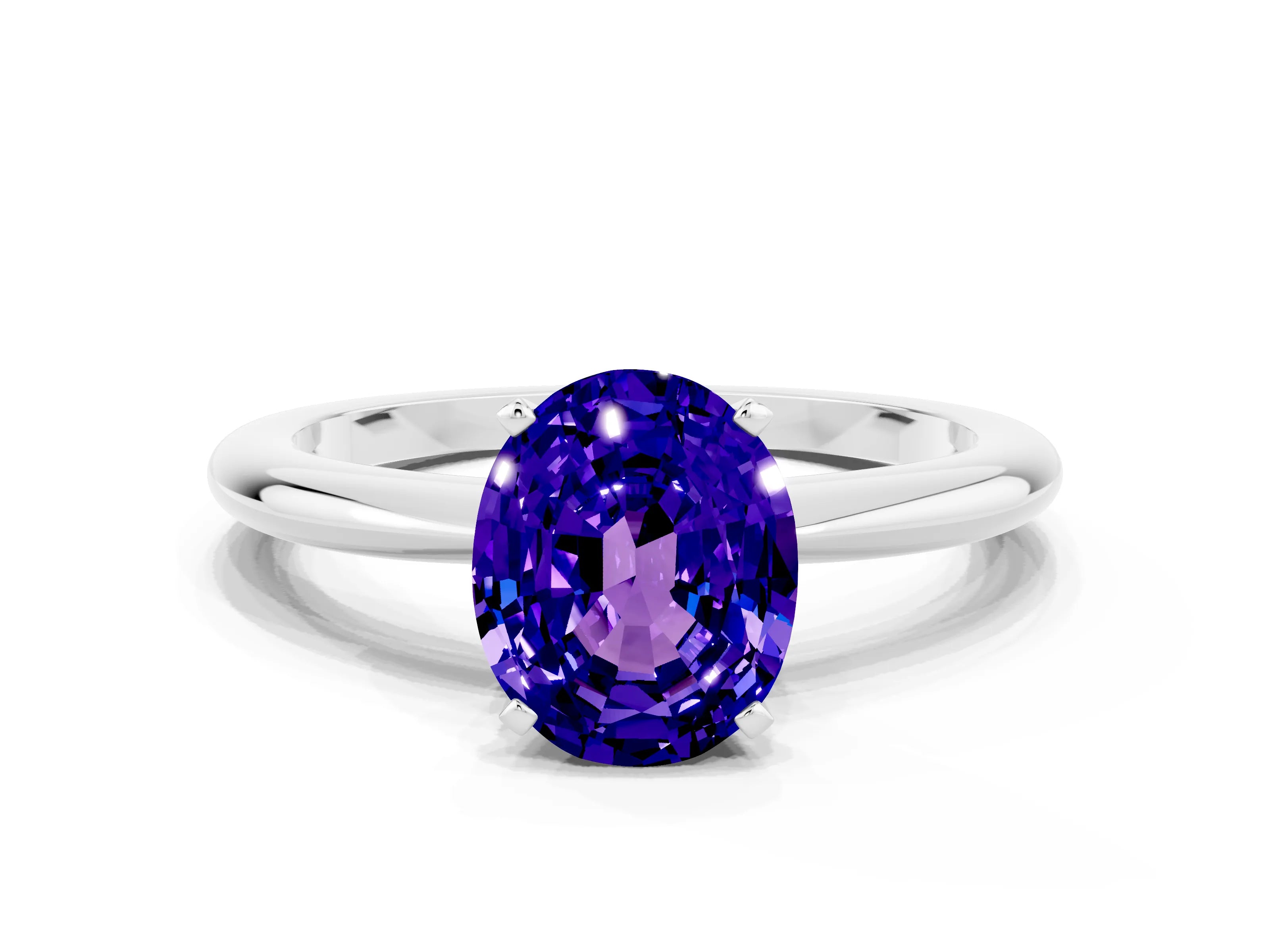 White gold Oval Cut Tanzanite Solitaire Ring with Six-Prong Setting and Classic Band