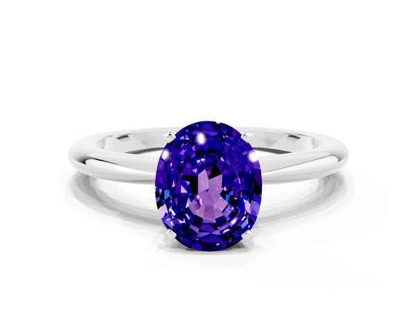 White gold Oval Cut Tanzanite Solitaire Ring with Six-Prong Setting and Classic Band