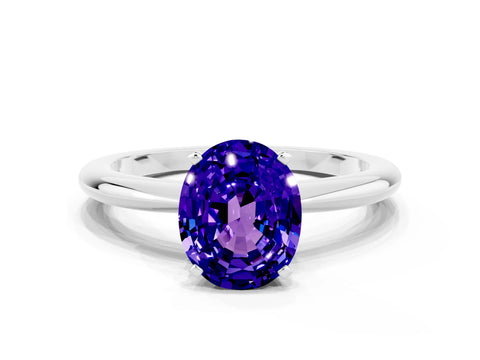 White gold Oval Cut Tanzanite Solitaire Ring with Six-Prong Setting and Classic Band