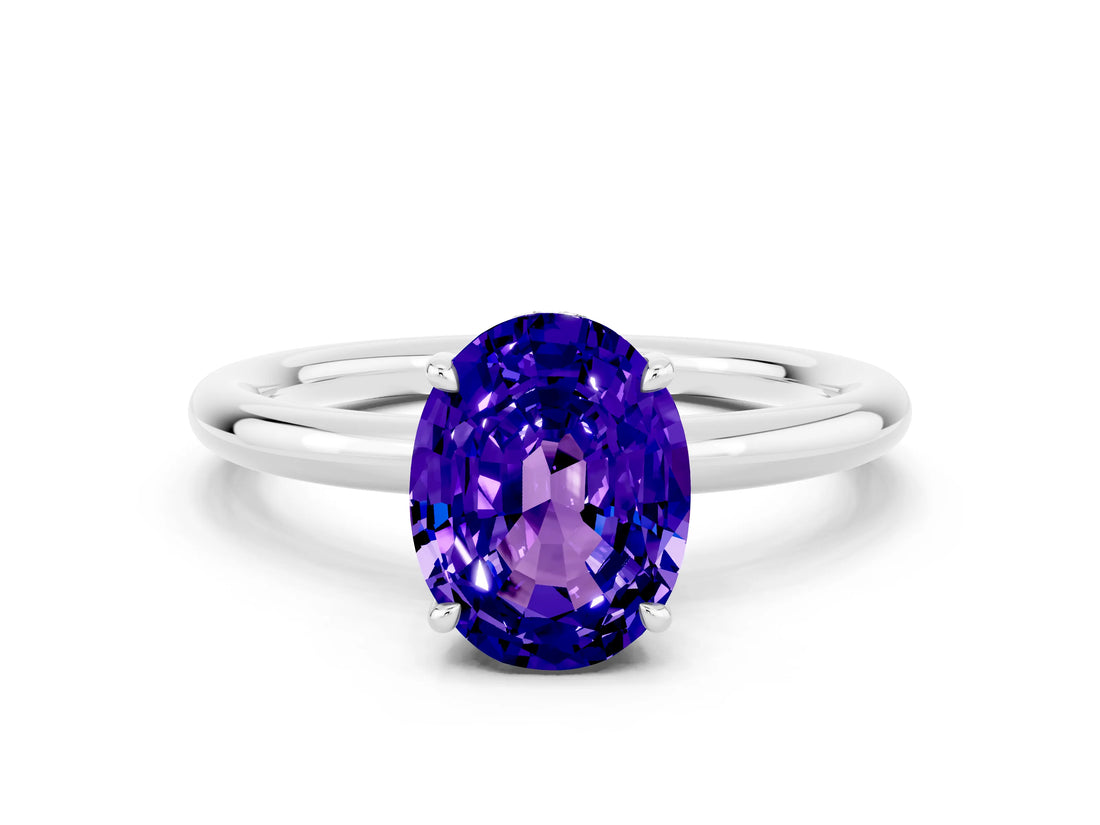 White gold Oval Cut Tanzanite Solitaire Ring with Thin Band and Four-Prong Setting_12
