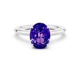 White gold Oval Cut Tanzanite Solitaire Ring with Thin Band and Four-Prong Setting_12