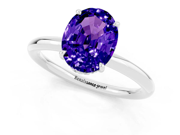 White gold Oval Cut Tanzanite Solitaire Ring with Thin Band and Four-Prong Setting