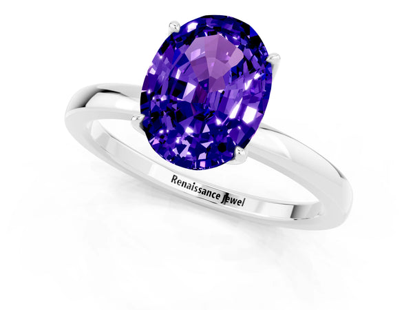 Platinum Oval Cut Tanzanite Solitaire Ring with Thin Band and Prong Setting