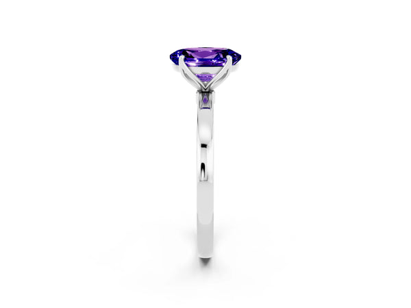 Silver Oval Cut Tanzanite Solitaire Ring with Thin Band and Prong Setting