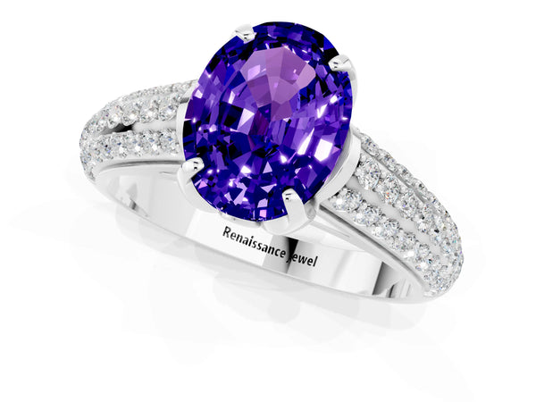 Silver Oval Cut Tanzanite Solitaire Ring with Three-Row Pavé Band and Four-Prong Setting