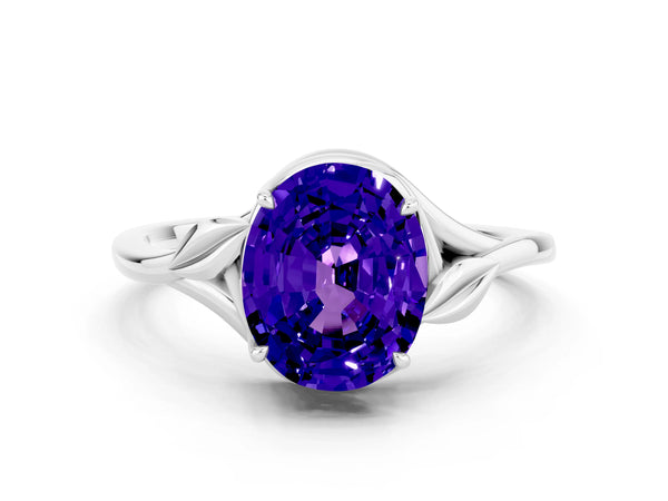 White gold Oval Cut Tanzanite Solitaire Ring with Twist Band and Four-Prong Setting