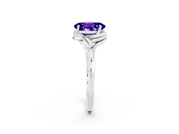 White gold Oval Cut Tanzanite Solitaire Ring with Twist Band and Four-Prong Setting
