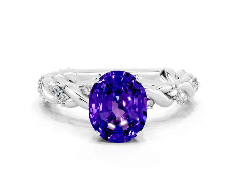 White gold Oval Cut Tanzanite Solitaire Ring with Twisted Band and Pavé Accents