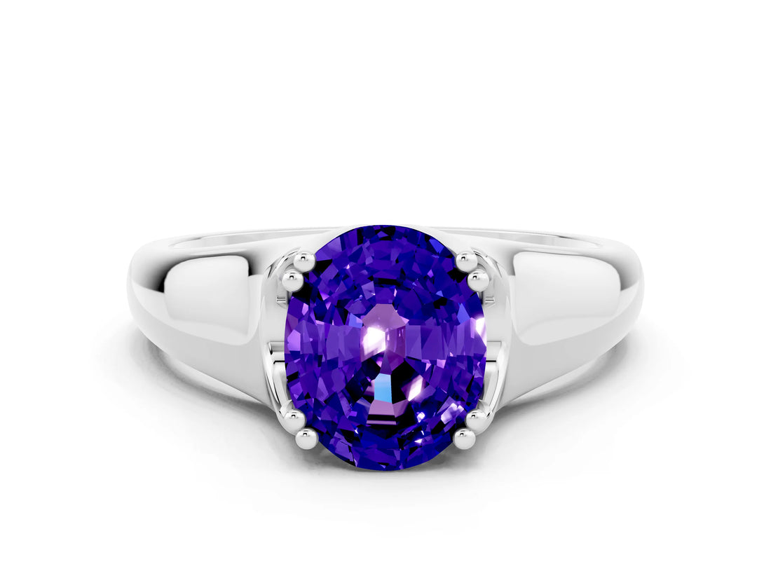 White gold Oval Cut Tanzanite Solitaire Ring with Wide Band and Prong Setting