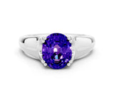 White gold Oval Cut Tanzanite Solitaire Ring with Wide Band and Prong Setting