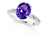 White gold Oval Cut Tanzanite Solitaire with Side Baguettes and Channel Set Band_1