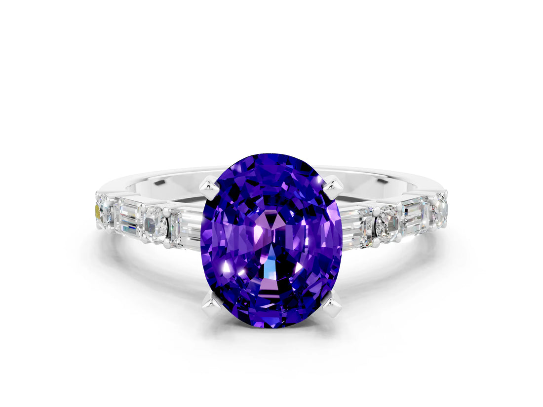 White gold Oval Cut Tanzanite Solitaire with Side Baguettes and Channel Set Band