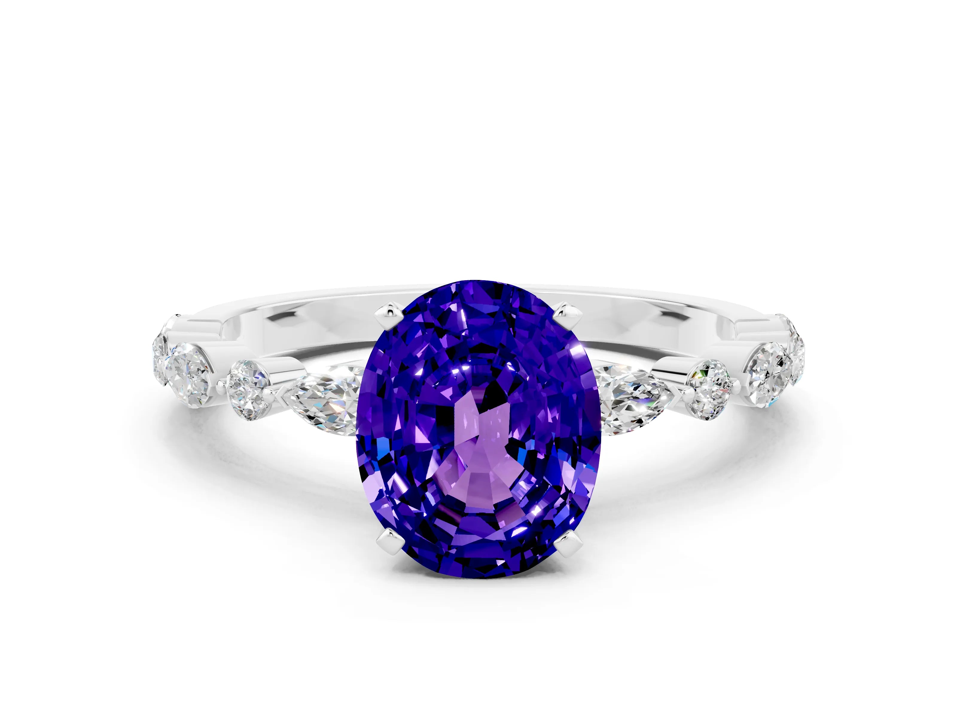 White gold Oval Cut Tanzanite Solitaire with Side Stones on a Pavé Band and Four-Prong Setting