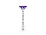 White gold Oval Cut Tanzanite Solitaire with Side Stones on a Pavé Band and Four-Prong Setting_2
