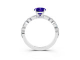 White gold Oval Cut Tanzanite Solitaire with Side Stones on a Pavé Band and Four-Prong Setting_3