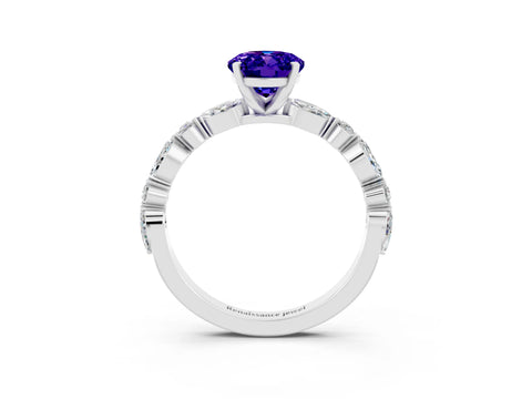 White gold Oval Cut Tanzanite Solitaire with Side Stones on a Pavé Band and Four-Prong Setting_3
