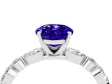 White gold Oval Cut Tanzanite Solitaire with Side Stones on a Pavé Band and Four-Prong Setting_4