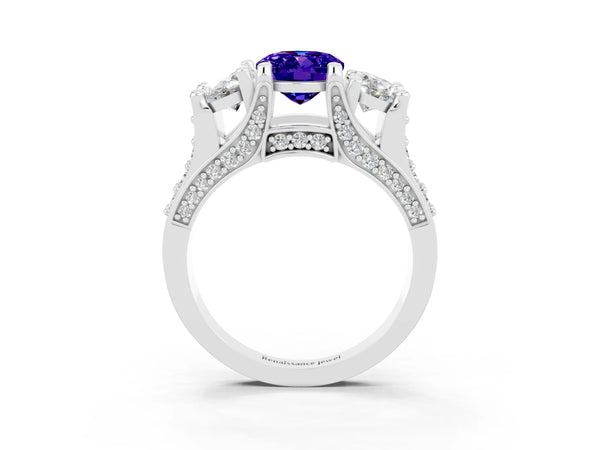 Silver Oval Cut Tanzanite Three-Stone Ring with Channel Set Band and Four-Prong Setting