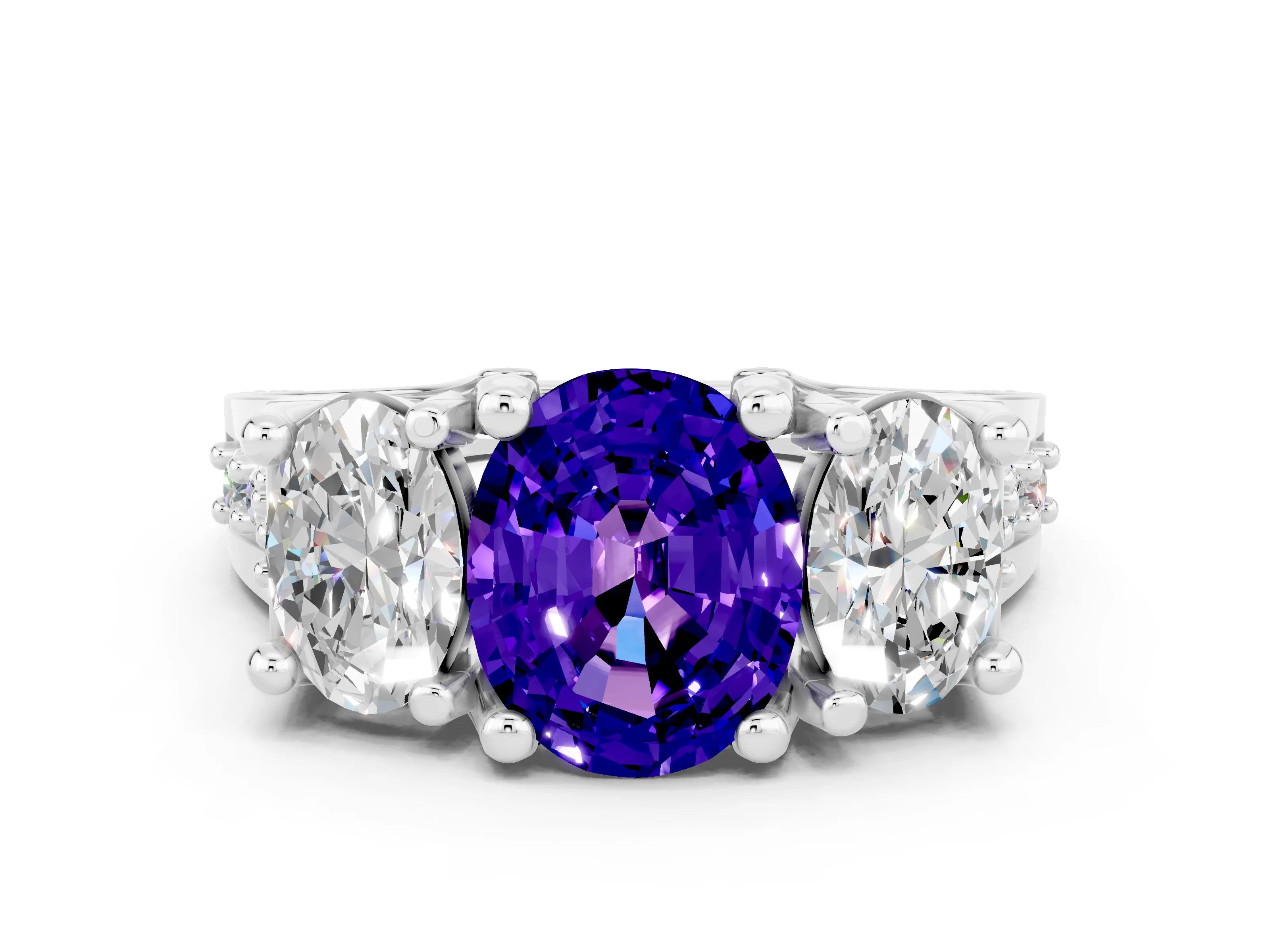 White gold Oval Cut Tanzanite Three-Stone Ring with Channel Set Band and Four-Prong Setting
