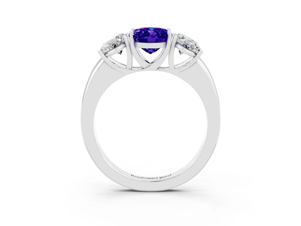 Platinum Oval Cut Tanzanite Three-Stone Ring with Four-Prong Setting and Classic Band