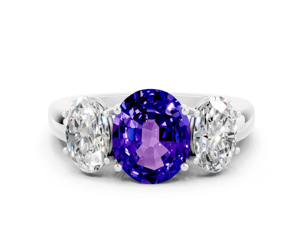 White gold Oval Cut Tanzanite Three-Stone Ring with Four-Prong Setting and Classic Band