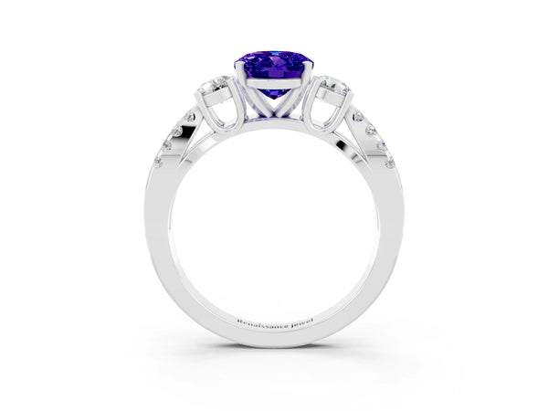 Platinum Oval Cut Tanzanite Three-Stone Ring with Pavé Split Shank and Four-Prong Setting