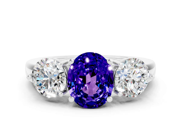 Silver Oval Cut Tanzanite Three-Stone Ring with Prong Setting and Classic Band