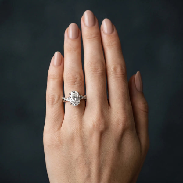 White gold Oval Cut Twist Band Solitaire Diamond Ring with Pavé Setting