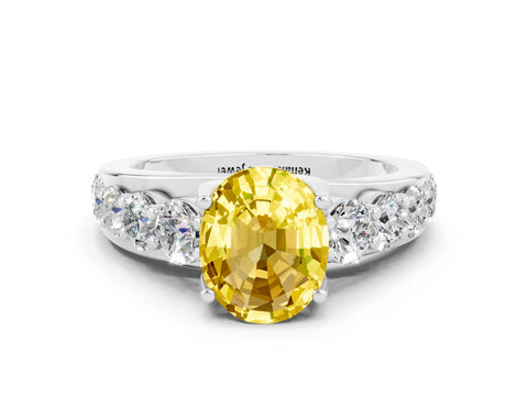 White gold Oval Cut Yellow Sapphire Engagement Ring with Pavé Band and Four-Prong Setting