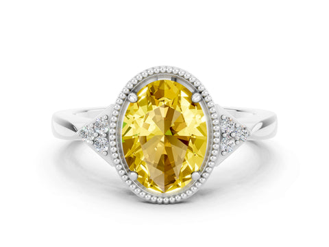 White gold Oval Cut Yellow Sapphire Halo Ring with Tapered Band and Four-Prong Setting