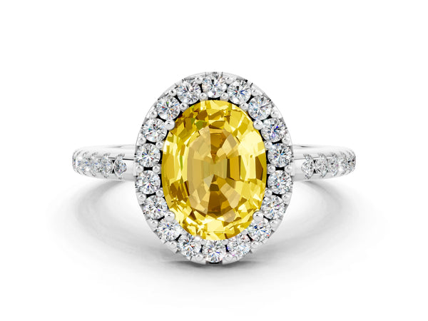Silver Oval Cut Yellow Sapphire Pavé Halo Ring with Four-Prong Setting
