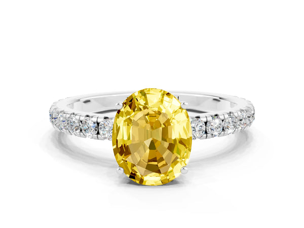 Platinum Oval Cut Yellow Sapphire Pavé Solitaire Engagement Ring with Four-Prong Setting