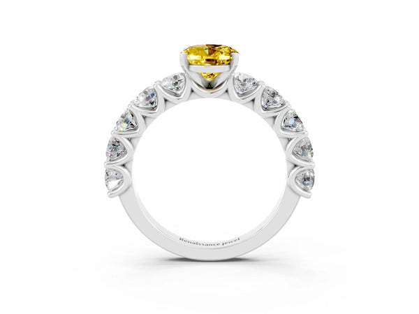 Silver Oval Cut Yellow Sapphire Prong Setting with Side Stones on a Pave Band