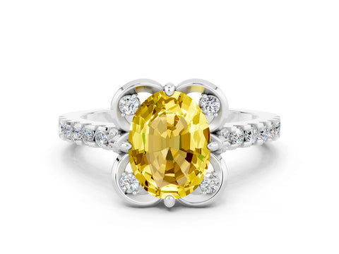 White gold Oval Cut Yellow Sapphire Ring with Pavé Band and Floral Prong Setting