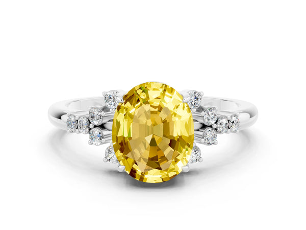Platinum Oval Cut Yellow Sapphire Ring with Side Stones and Four-Prong Setting