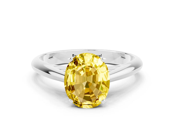 White gold Oval Cut Yellow Sapphire Solitaire Engagement Ring with Cathedral Setting and Four-Prong Mount