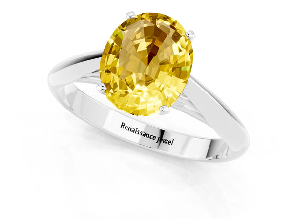 White gold Oval Cut Yellow Sapphire Solitaire Engagement Ring with Cathedral Setting and Four-Prong Mount