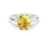 White gold Oval Cut Yellow Sapphire Solitaire Engagement Ring with Cathedral Setting and Four-Prong Mount_84