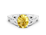 White gold Oval Cut Yellow Sapphire Solitaire Engagement Ring with Celtic Knot Band and Four-Prong Setting_24