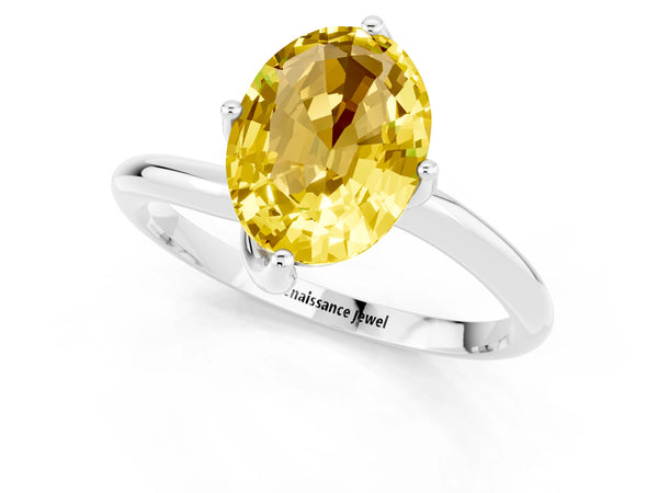 Silver Oval Cut Yellow Sapphire Solitaire Engagement Ring with Four-Prong Setting and Classic Band