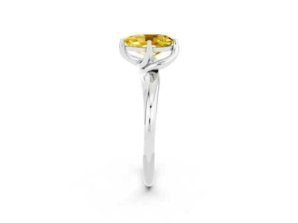 Silver Oval Cut Yellow Sapphire Solitaire Engagement Ring with Four-Prong Setting and Classic Band